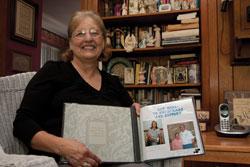 Photo By Edward Izquierdo. When Gloria Johns first attempted to form a support group for ovarian cancer patients, she was told they don't live long enough to join a support group. She proved otherwise and has the photos (above) to show it.